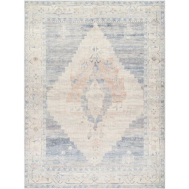 A traditional denim/navy area rug with a geometric pattern, crafted in Turkey.